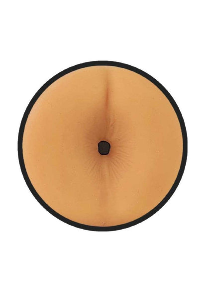 Tan silicone belly button cover with black border and central hole for prowler red manhole stroker