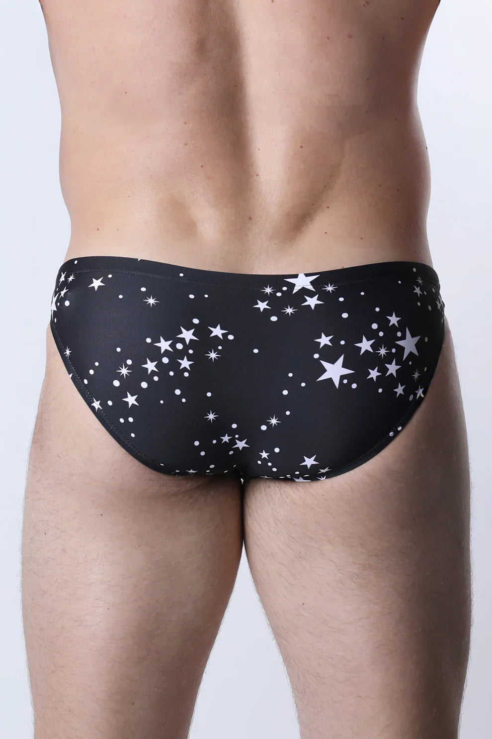 Pulse swim brief black swim trunks with white stars and dots pattern designed for swimming and beachwear