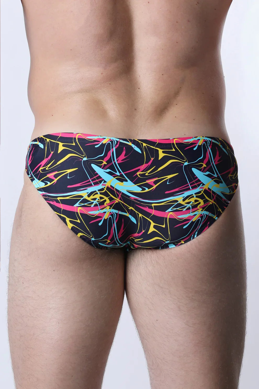Pulse swim brief vibrant abstract graffiti patterned trunks in black neon pink yellow and cyan for swimming and beachwear