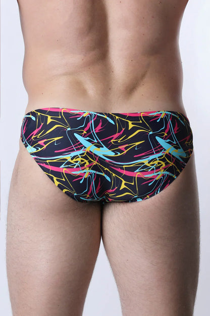 Pulse swim brief vibrant abstract graffiti patterned trunks in black neon pink yellow and cyan for swimming and beachwear