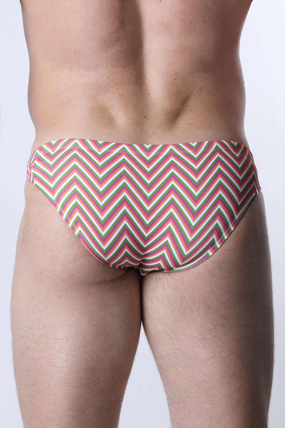 Pulse swim brief vibrant zigzag-patterned swim trunks in pink green and cream perfect for beachwear