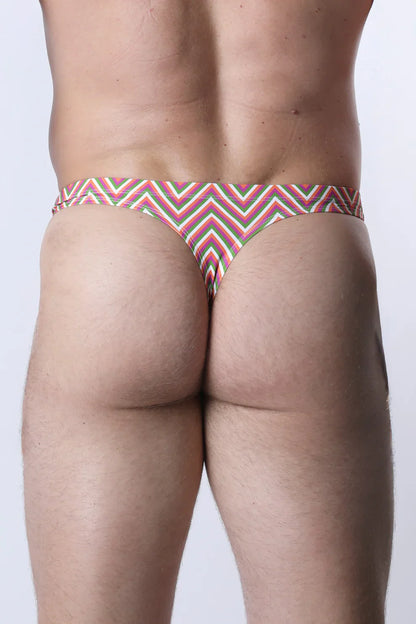 Pulse swim thong vibrant patterned with bold pink red and green zigzag stripes showing the front side