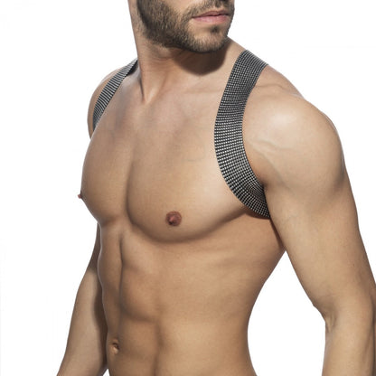 Black mesh shoulder straps with textured grid pattern on the back of pushpin spider harness