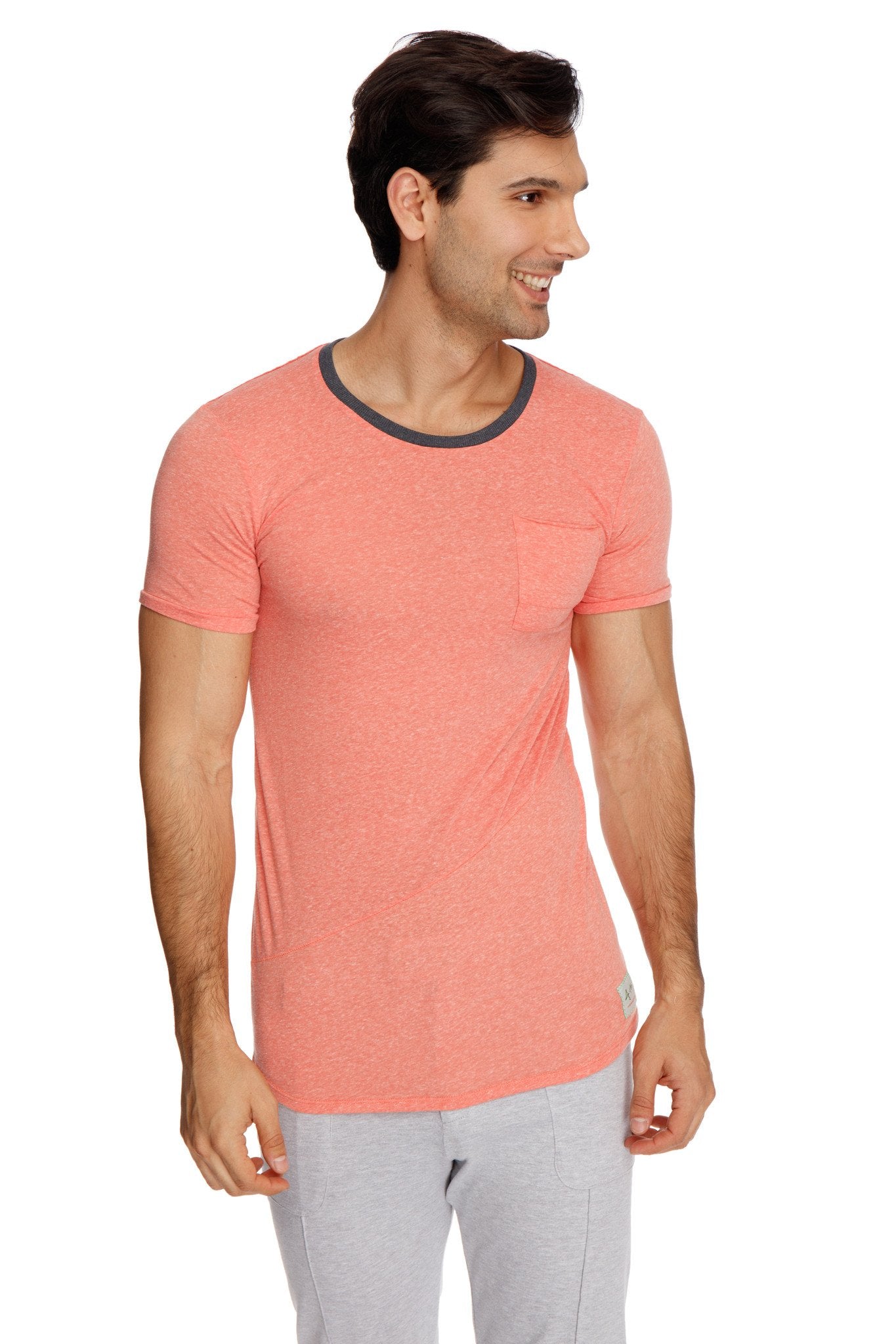 Coral-colored perfect pocket crew-neck tee with dark gray ribbed crew neckline and chest pocket in apricot slub material