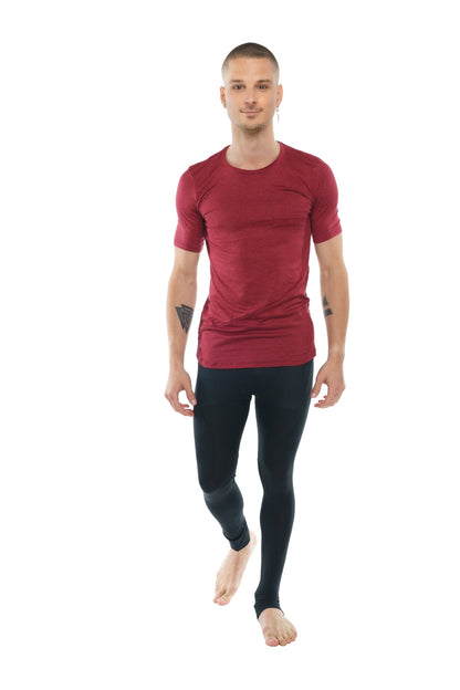 A sleek form-fitting brick red heather short-sleeved athletic tee with crew neck and subtle texture perfect for workouts