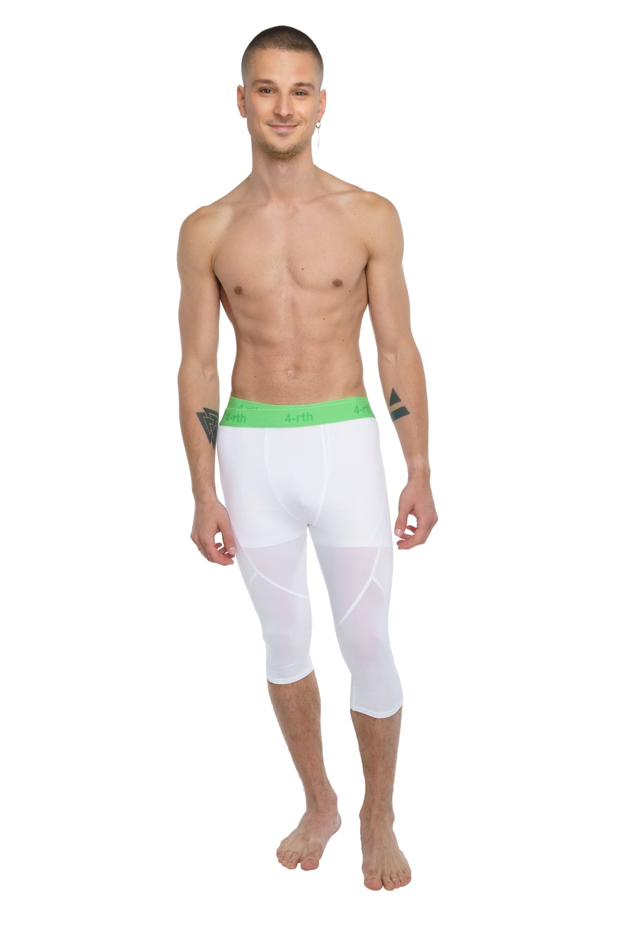 White capri-length performance yoga leggings in arctic white with a bright green elastic waistband designed for active use