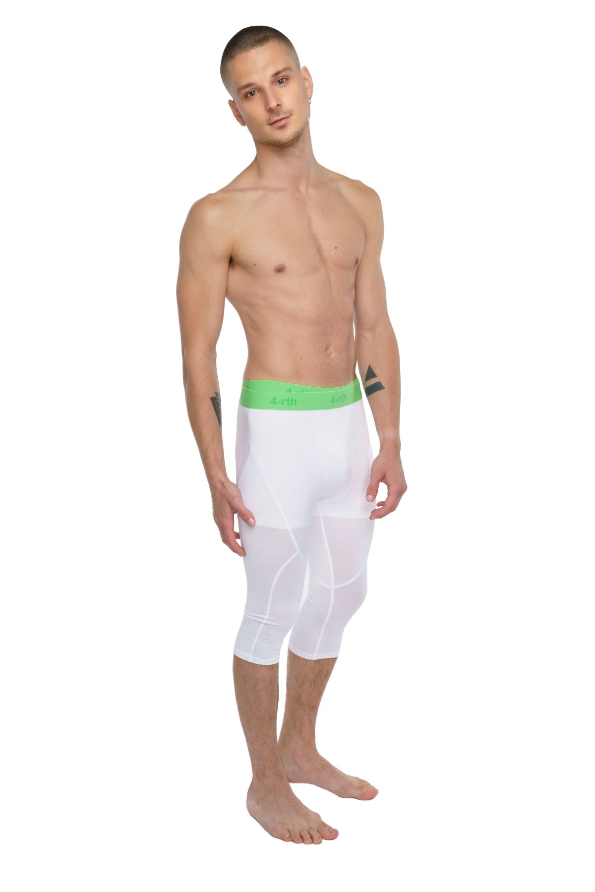 White performance yoga leggings 3/4 with bright green waistband designed for athletic wear