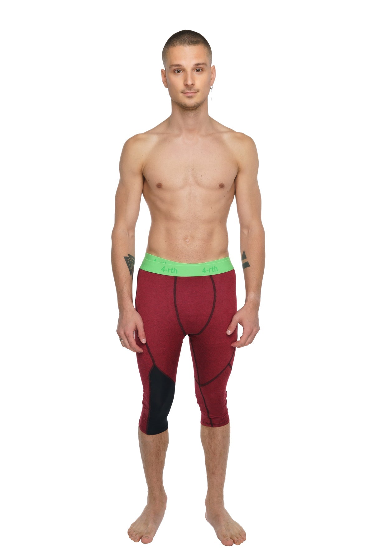 Performance yoga leggings 3/4 length in maroon and black with a bright green waistband for athletic use