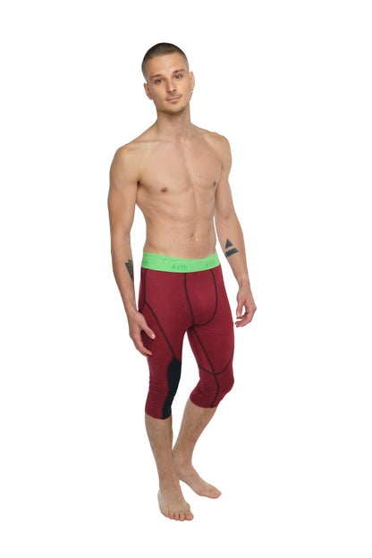 Performance yoga leggings 3/4 in brick red heather with bright green waistband and black panel accents for athletic use