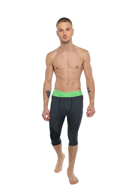 Black charcoal heather performance yoga leggings with bright green waistband for compression and comfort