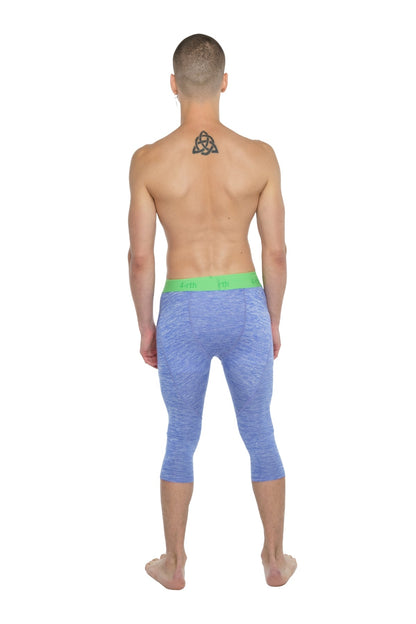 Performance yoga leggings 3/4 in blue heathered fabric with a bright green waistband for active wear