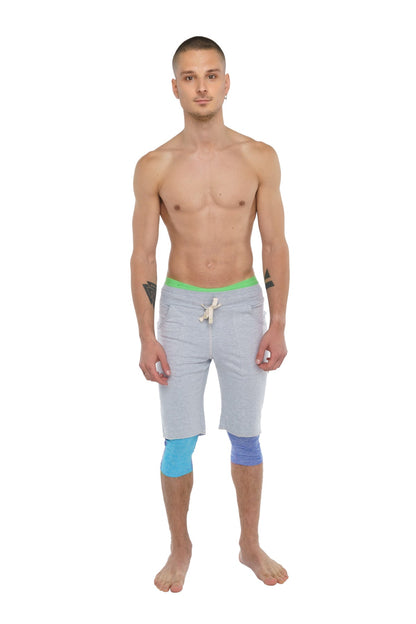 Performance yoga leggings 3/4 in lavender heather with light gray shorts bright green waistband and blue knee patches