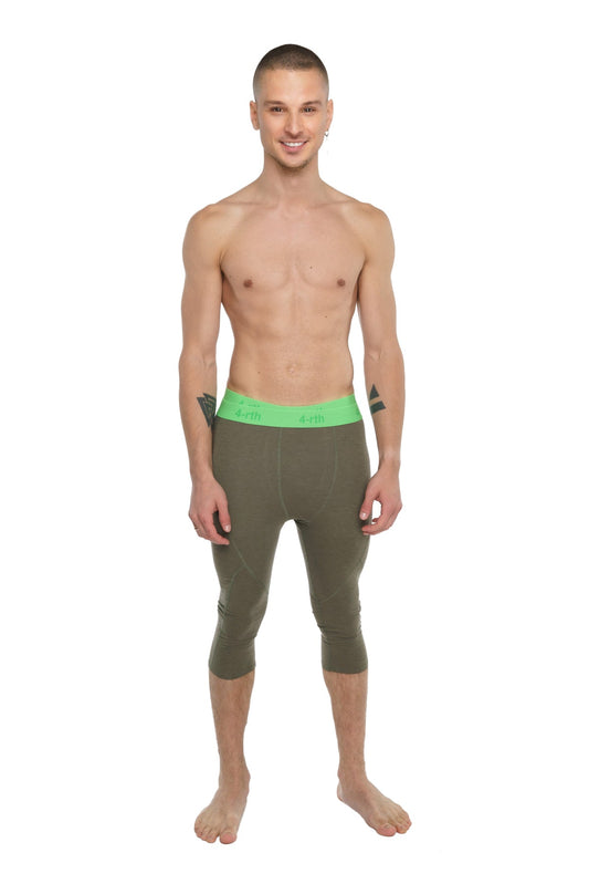 Olive green capri-length performance yoga leggings with neon green calvin klein waistband for activewear