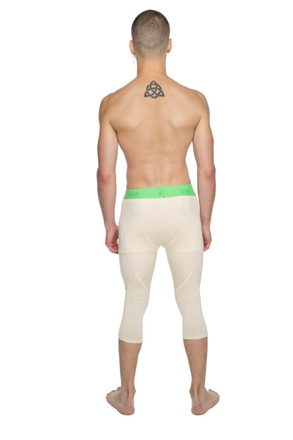 Performance yoga leggings 3/4 in sand beige with cream-colored fabric and bright green elastic waistband for comfort