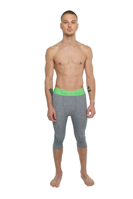 Performance yoga leggings 3/4 in steel heather gray with bright green elastic logo waistband and capri length