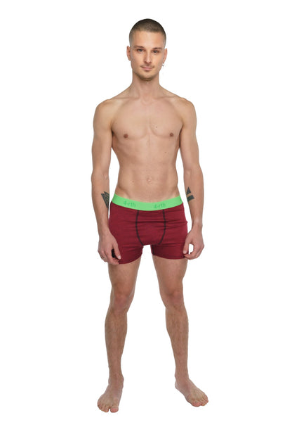 Performance yoga leggings short in brick red heather with a bright green elastic waistband for active wear