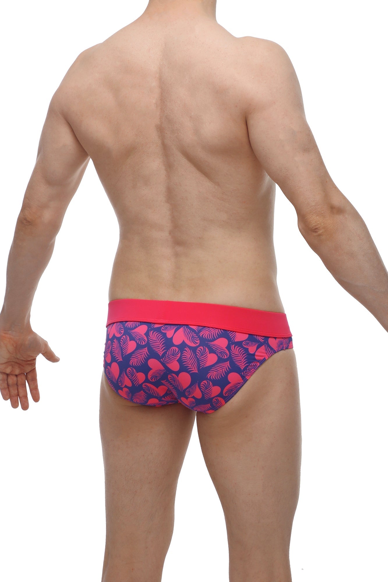 PetitQ brief Blaru tropical hearts men’s briefs with vibrant pink and navy heart leaf pattern and solid red waistband