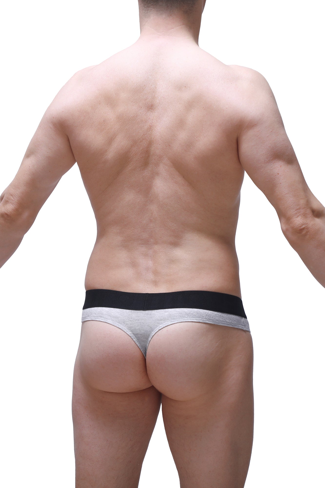 Gray thong underwear with black elastic waistband made from soft dome modal fabric by PetitQ shown from the back side