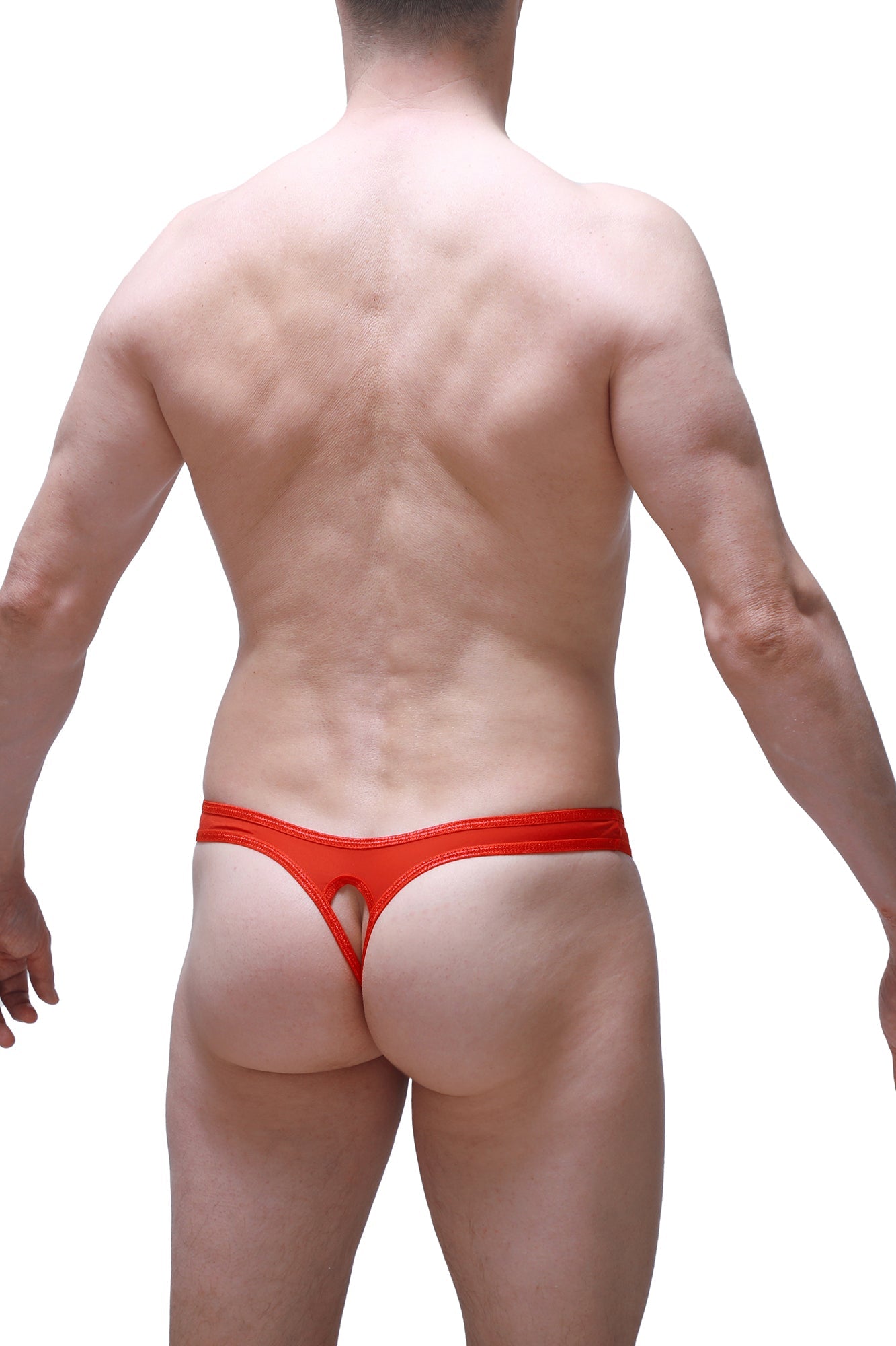 Bright red petitq thong made of stretchy fabric with a central cutout in a form-fitting design
