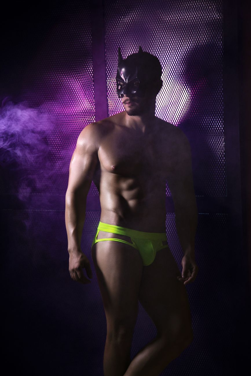 A man wearing a black batman mask and neon green pikante PIK 2114 Lenox briefs showcasing the front view