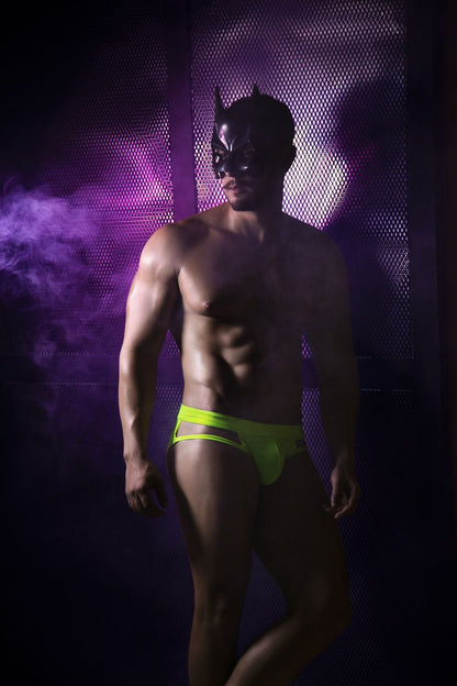 A man wearing a black batman mask and neon green pikante PIK 2114 Lenox briefs showcasing the front view