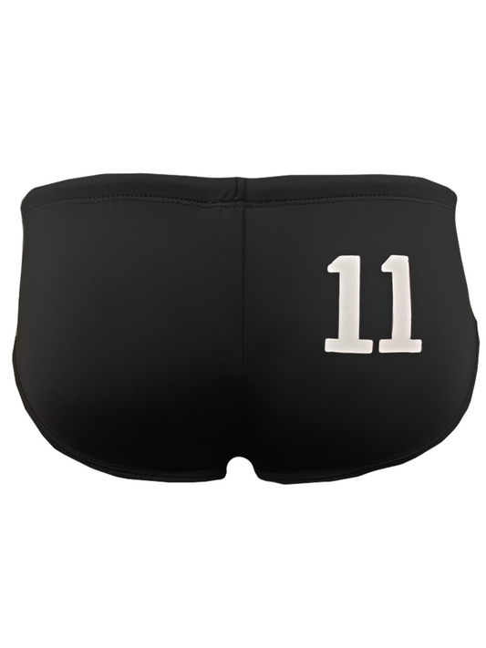 Black pride 11 swim brief showing the back with bold white number 11 embroidered on athletic swim shorts