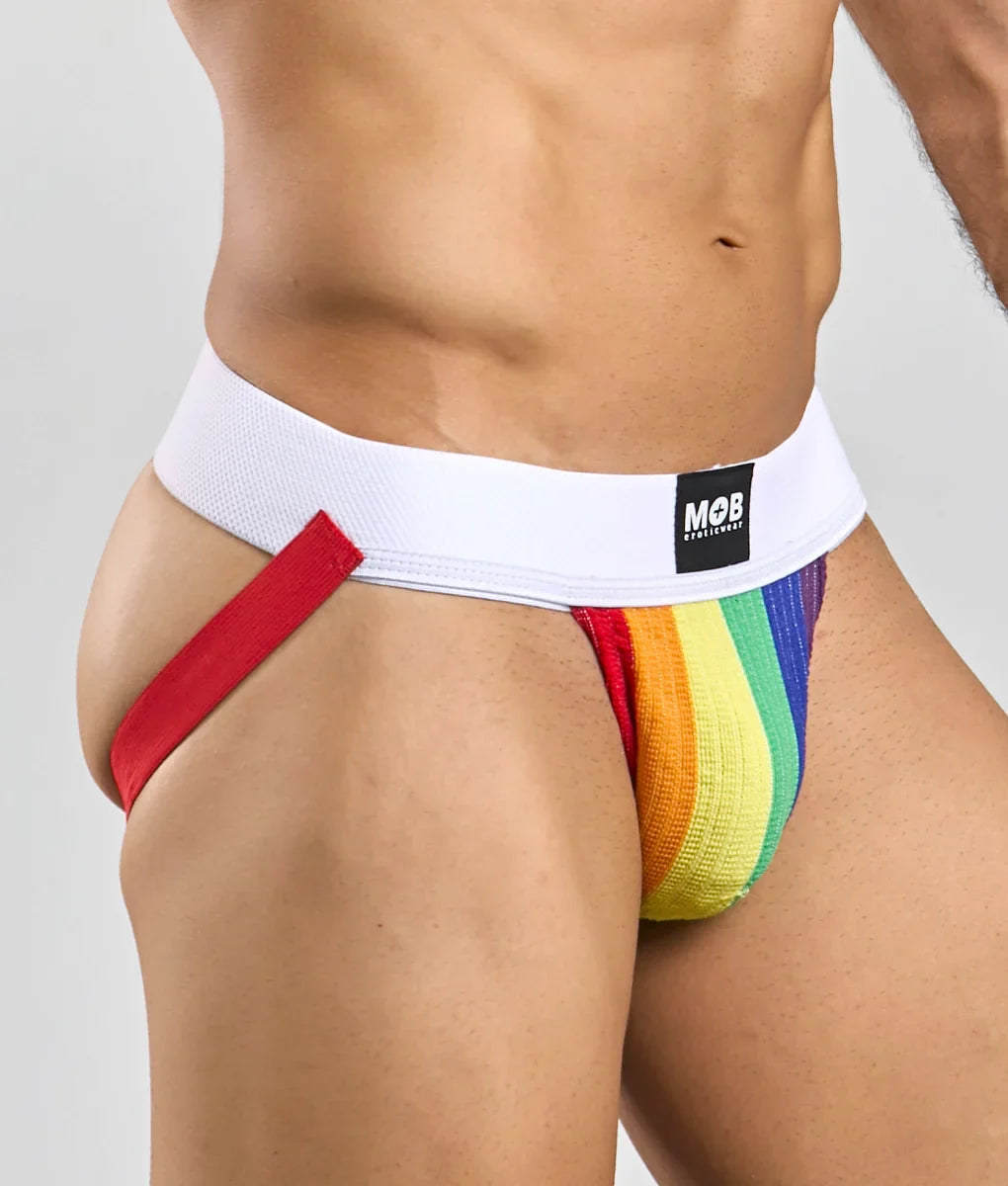 Pride flag colors jockstrap with rainbow-striped briefs, white waistband, red side strap, and mob underwear logo
