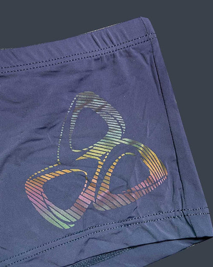 Dark blue silk athletic shorts with vibrant rainbow-striped abstract logo by private structure bruth4390 bare hipster