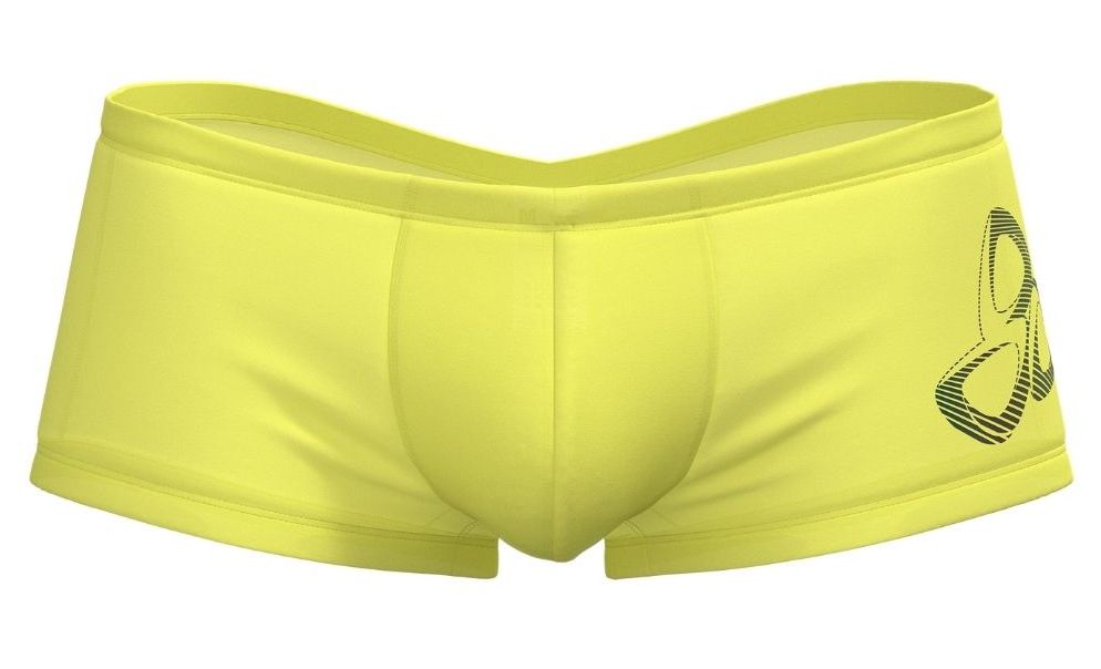Bright yellow private structure brut4390 bare hipster swim trunks with black stylized logo on the side