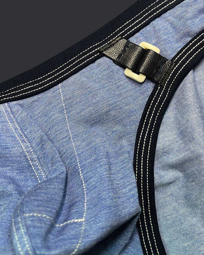 Private structure lcut4358 barn boy low rise mini brief denim with black leather strap and cream plastic buckle on blue denim