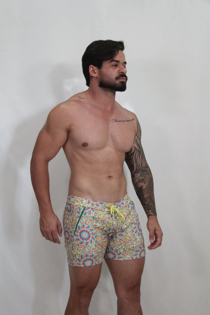 Rainbow kaleidoscope linen texture shorts multicolored patterned swim trunks with vibrant design and bright yellow drawstring
