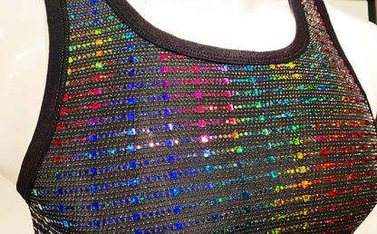 A black sequined tank top adorned with vibrant rainbow rhinestones in diagonal stripes called rainbow sequin tank