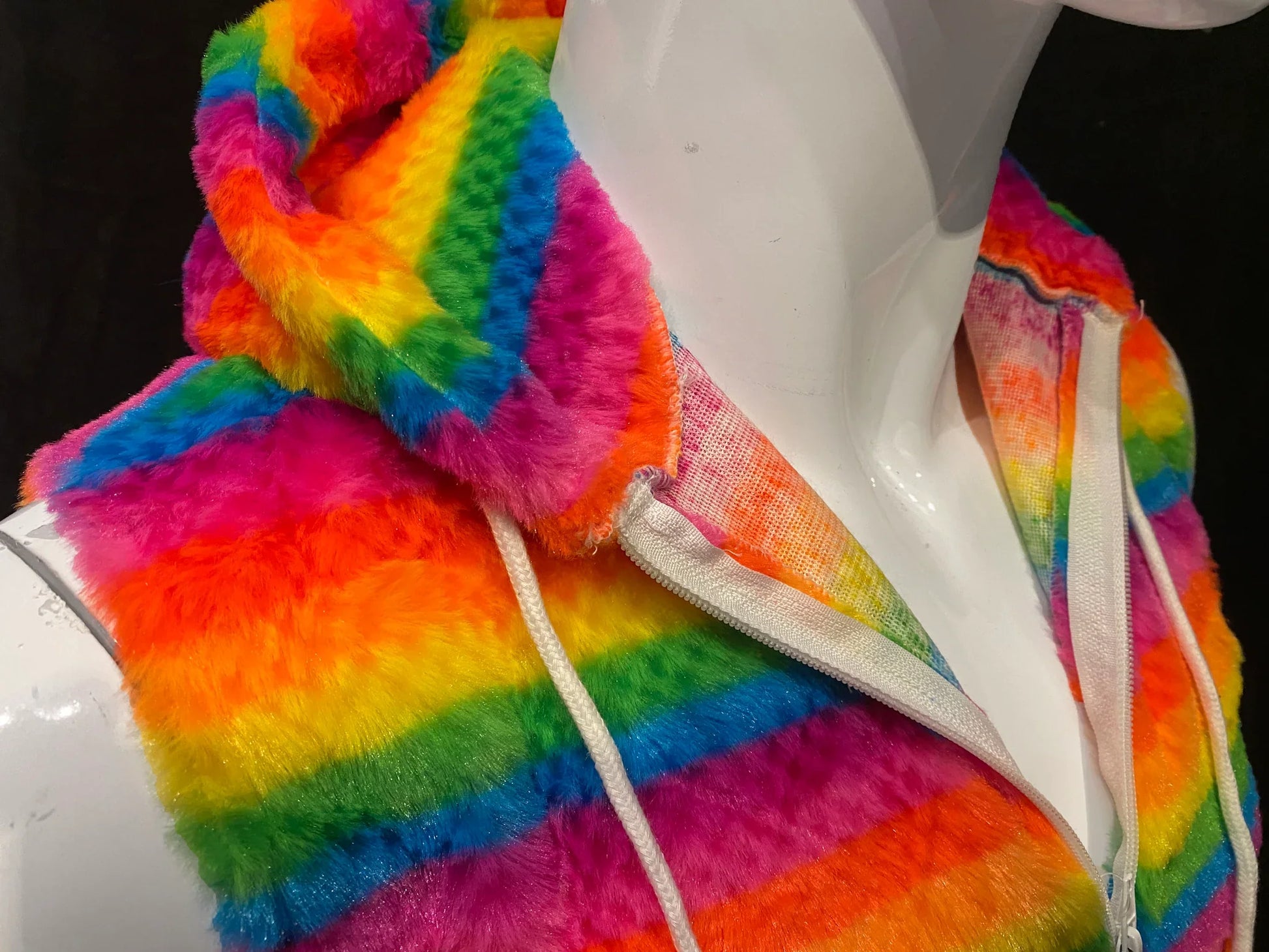 Rainbow stripe faux fur hoodie fuzzy vest with vibrant rainbow stripes plush material and white drawstrings