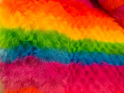 Rainbow stripe faux fur hoodie with vibrant red orange yellow green blue and pink fluffy fabric stripes
