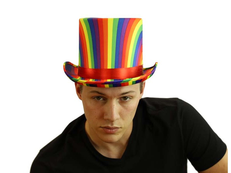 A vibrant rainbow-striped top hat with a glossy red band perfect for colorful costume and party wear