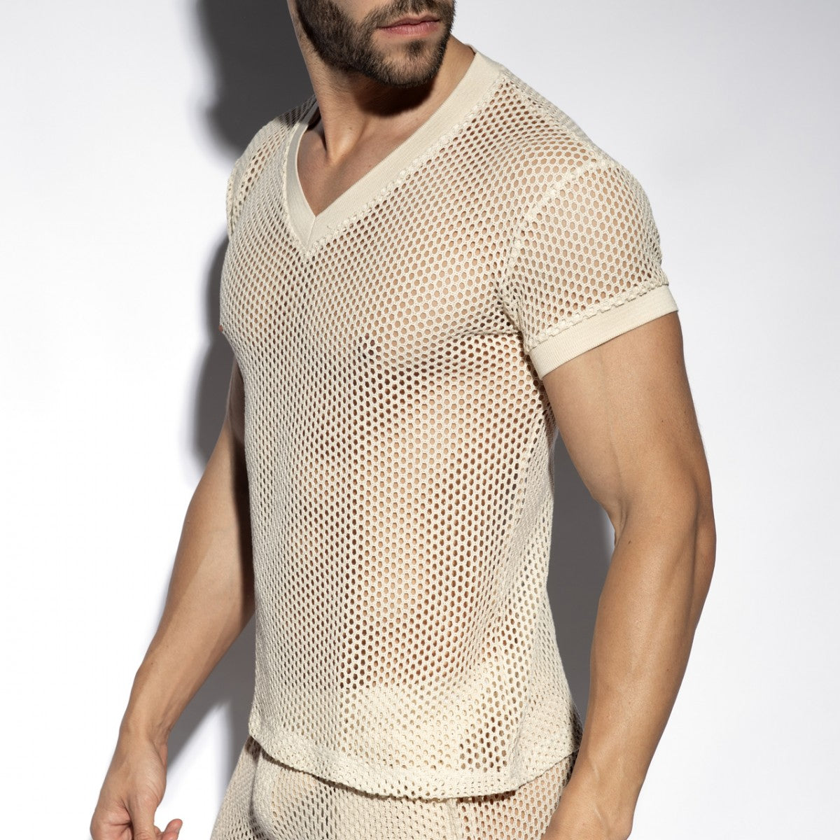 Beige mesh raw crochet t shirt with v neck short sleeves and subtle textured pattern for casual wear