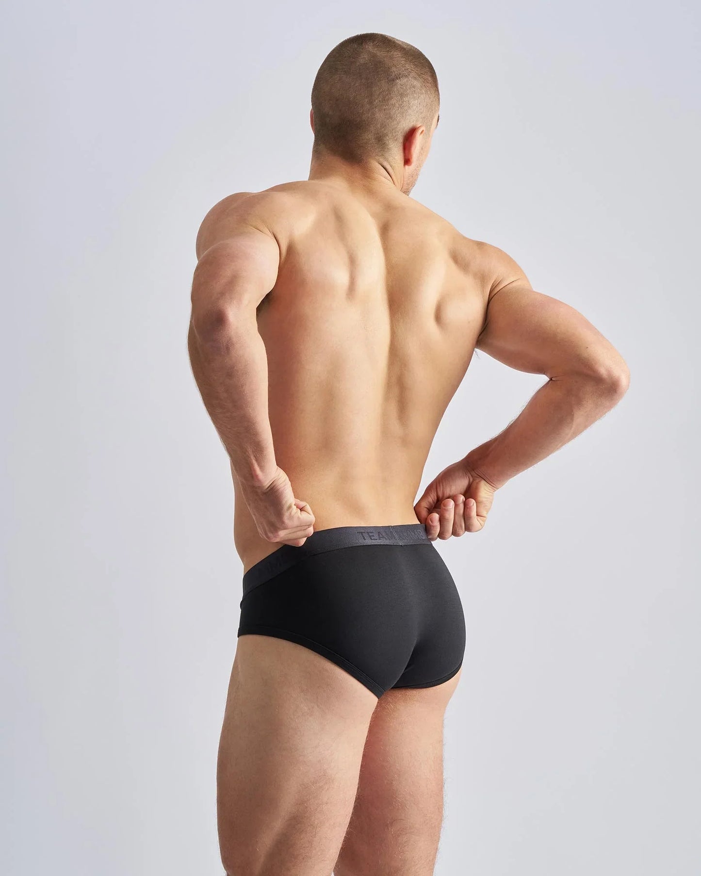 Reign brief black briefs with dark gray elastic waistband designed for comfortable daily wear