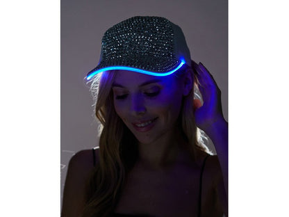 A sparkling black rhinestone light up cap with glowing blue led trim for stylish nightwear and events