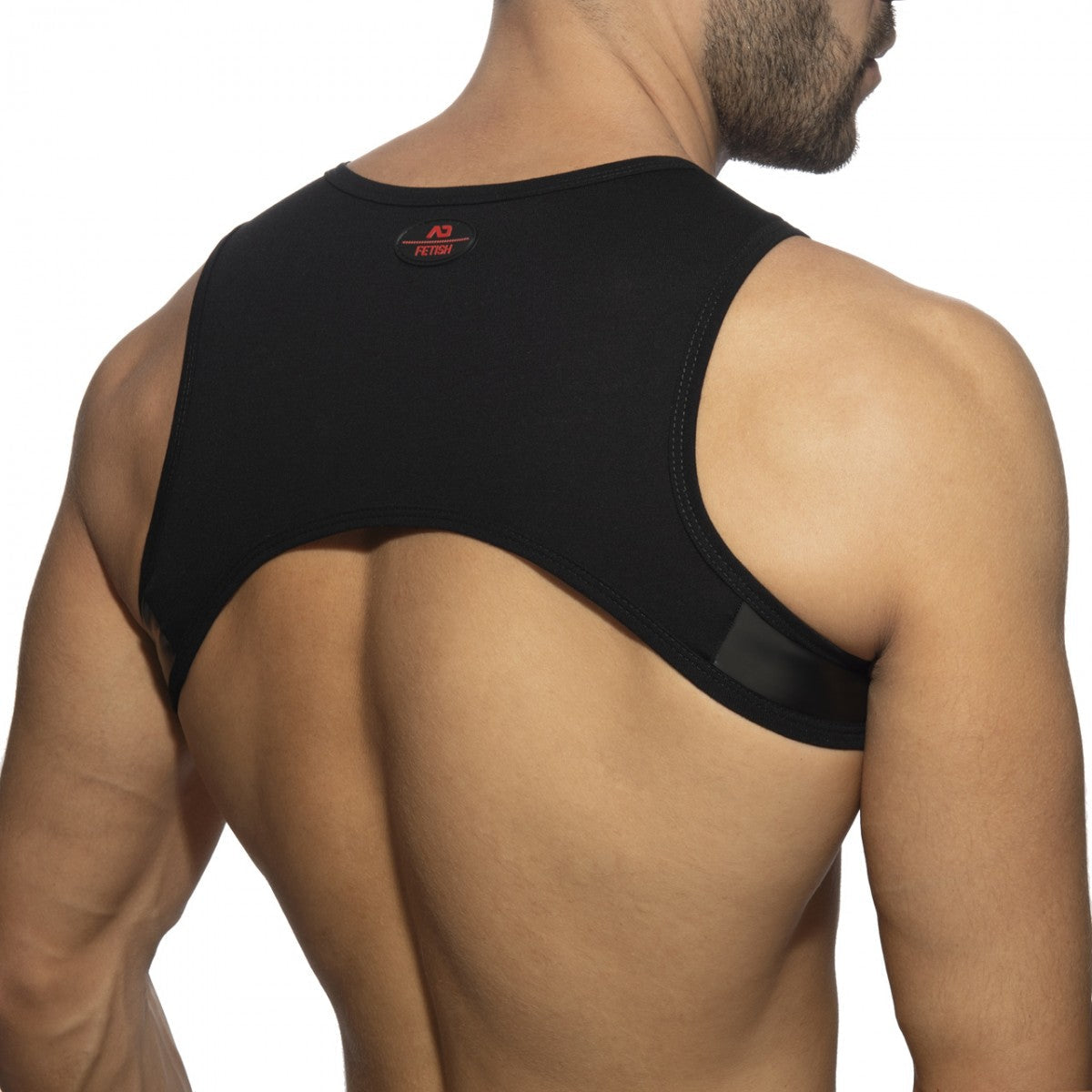 Black rind plan harness back support garment showing sleek form-fitting design for fetish wear