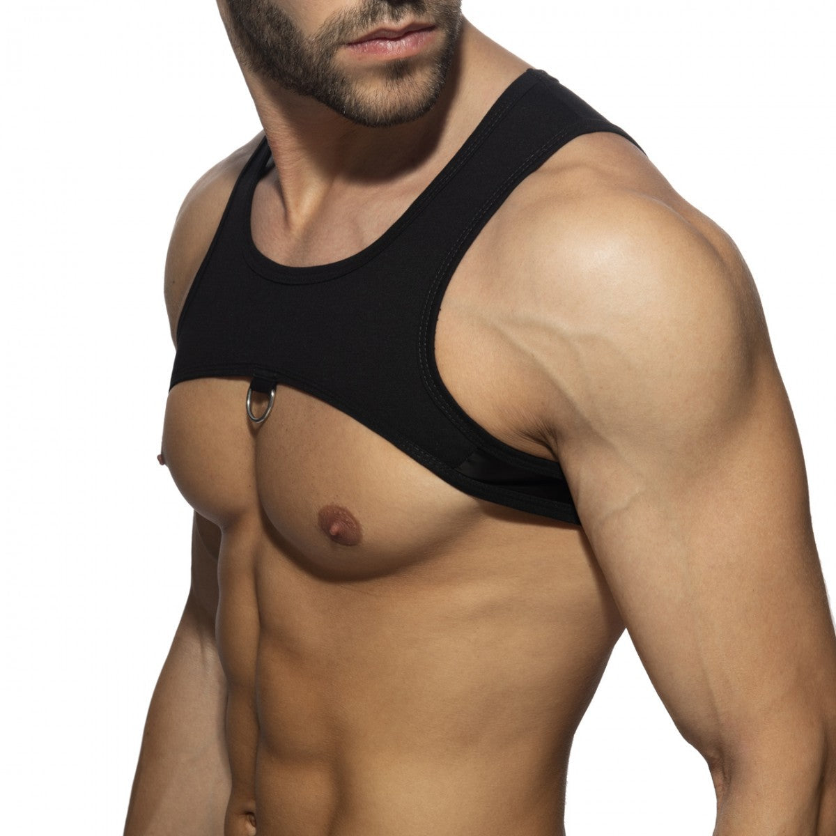 Black sleeveless top ring plan harness with metallic ring detail at center front for stylish layering
