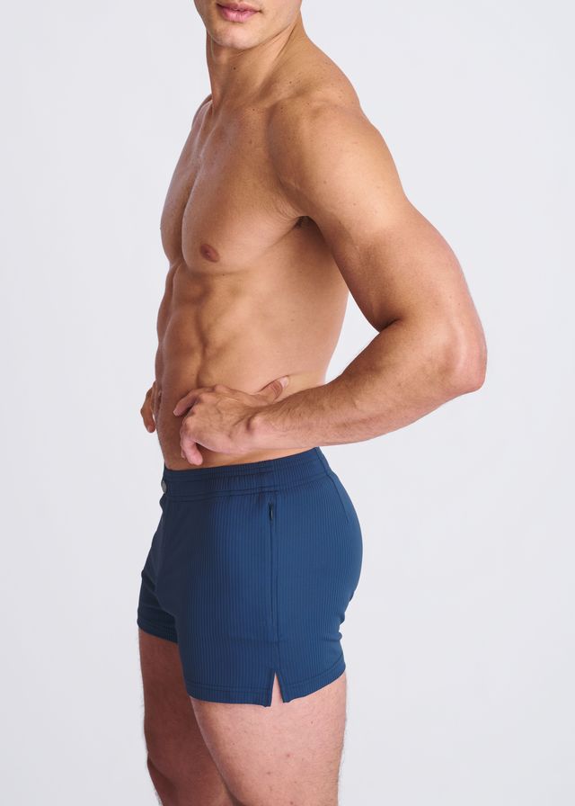 Navy blue ribbed riviera seersucker swim shorts with side zipper split hem and mesh lining for athletic use