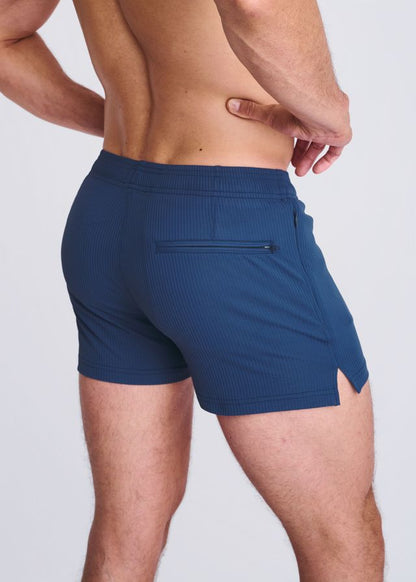 Navy blue riviera seersucker swim shorts with mesh lining textured fabric side zip pocket and hem cutout