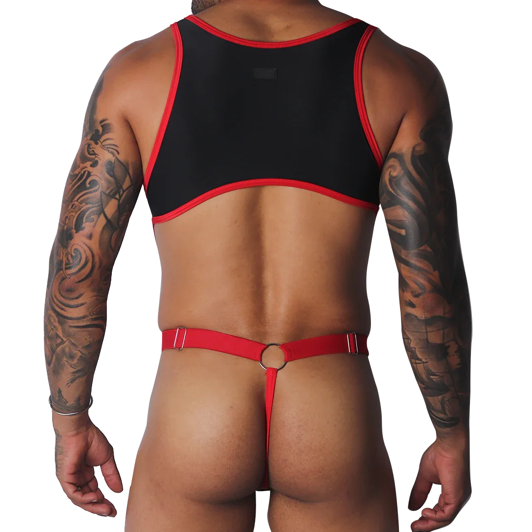 Black and red cropped tank top with thin shoulder straps paired with a red thong strap and metal ring detail.