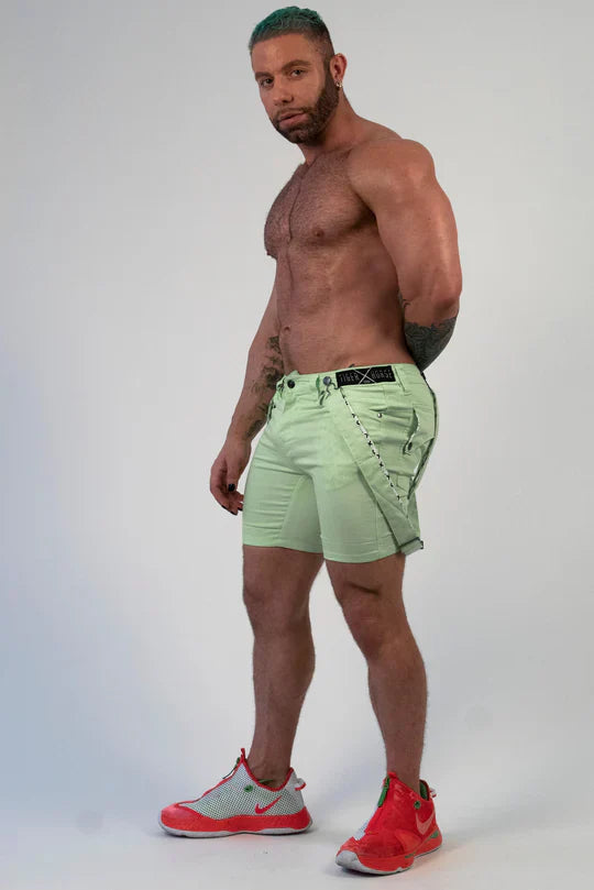 Light green romey shorts with black belt and stitched detailing in durable cargo fabric for casual wear