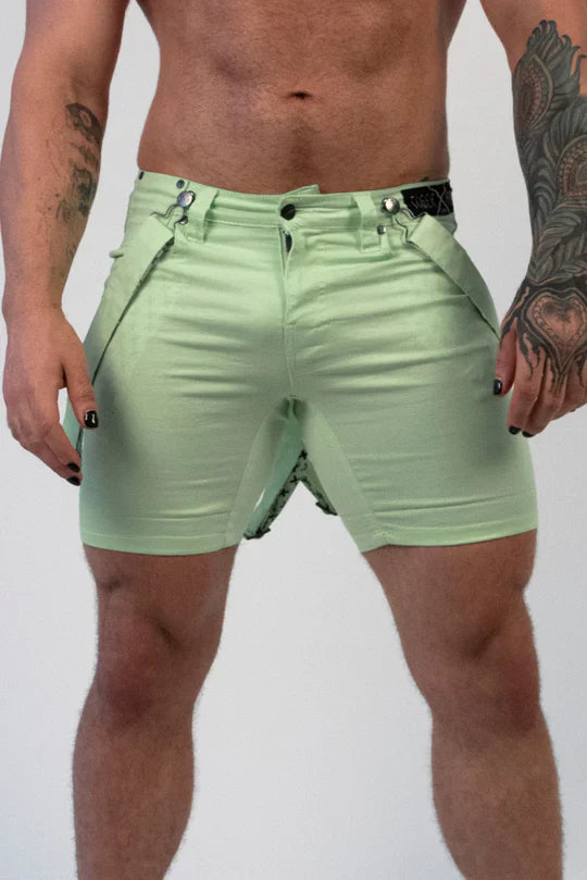 Romey shorts in light green with sleek fit and black belt accents showcasing a modern design