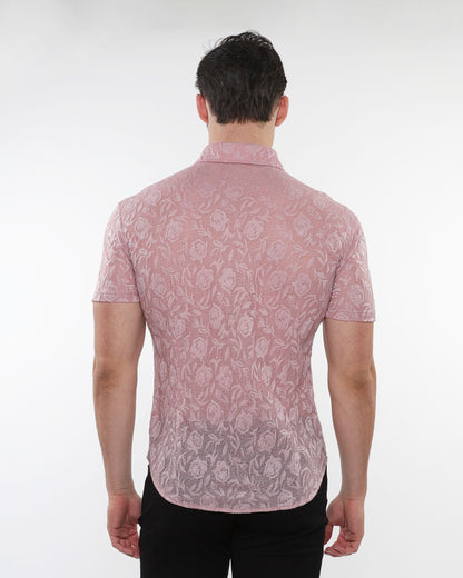 A pink short sleeved roses leaves gossamer knit shirt with a subtle floral lace pattern and button up front