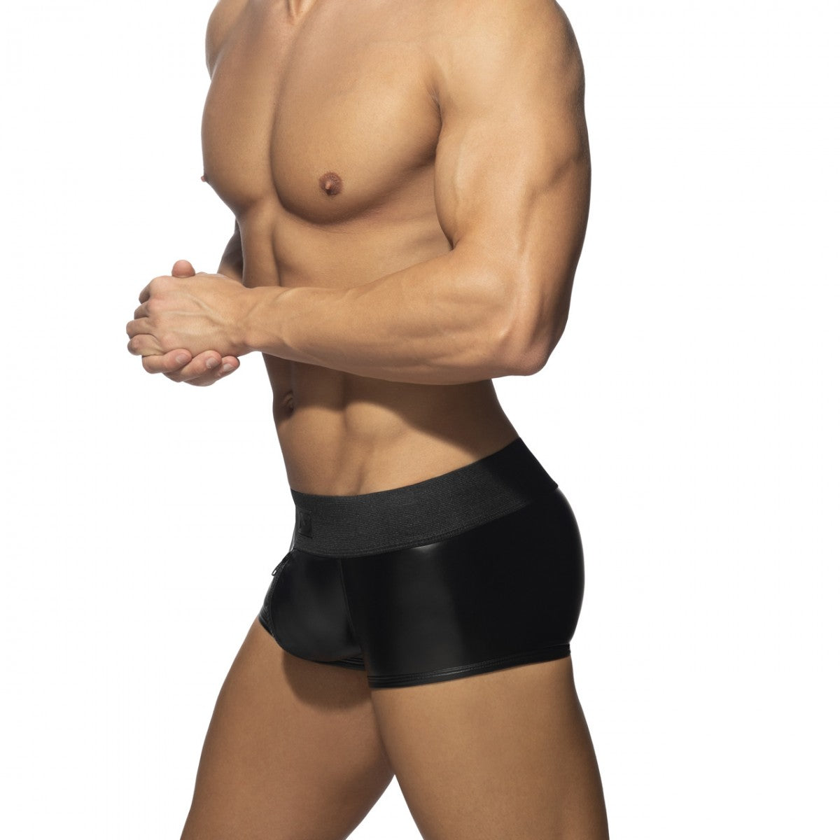 Black glossy finish rub trunk briefs with front to back zip and smooth form fitting design