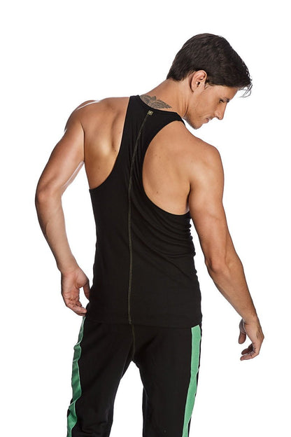 Back view of black racer-back yoga tank with central zipper and green striped matching pants for athletic wear