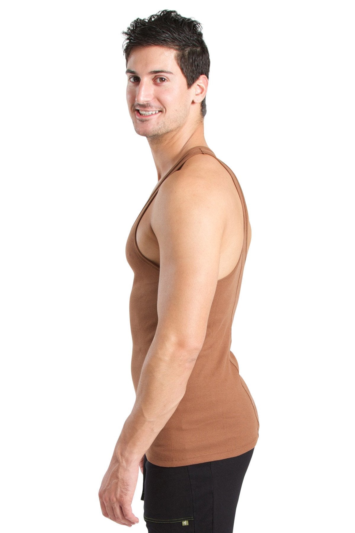 A man wearing a fitted tan racer-back yoga tank in chocolate color designed for active wear
