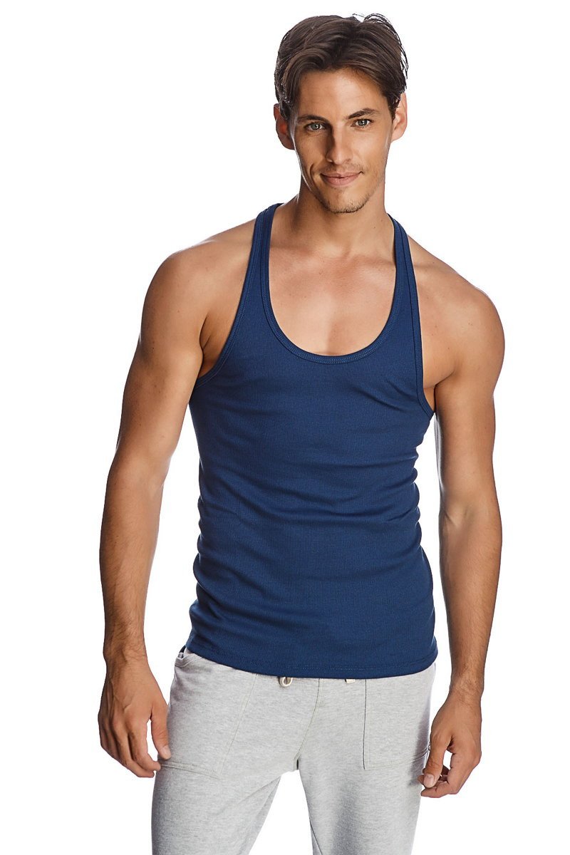 Navy blue racer-back yoga tank top with rounded neckline and ribbed hem trim designed for comfort and flexibility